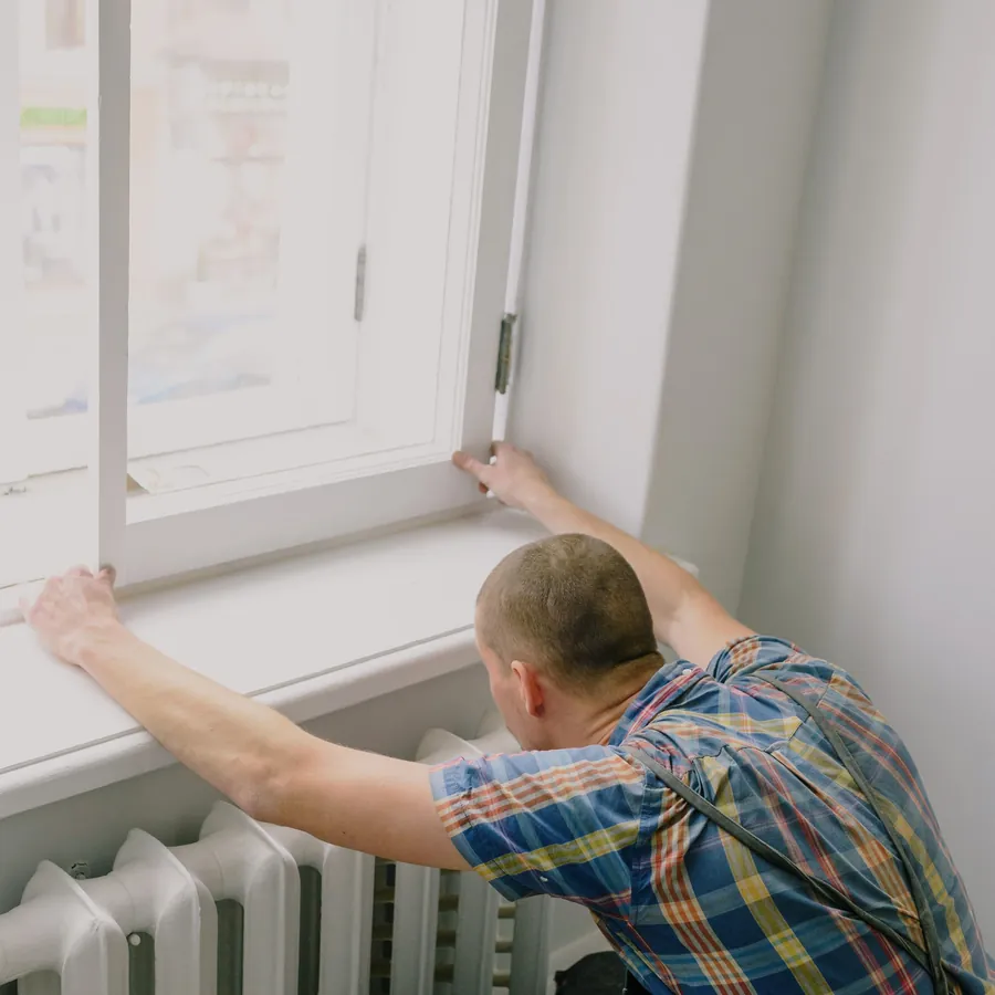 Radiator being positioned beneath a window
